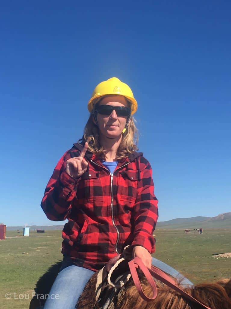 A photo of me horse riding which is something I love to do on a trip to Kyrgyzstan