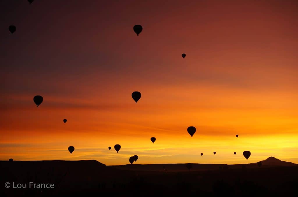 Watching hot air balloons at sunrise is one of the best things to do in Cappadocia