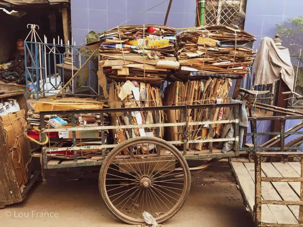 A rickshaw crammed with cardboard is a typical scene in Kolkata street photography